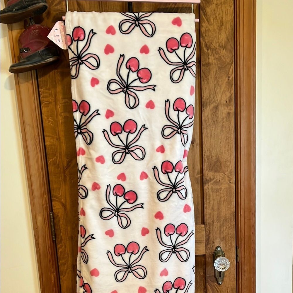 Betsey Johnson Cream Throw with Pink and Black Bow